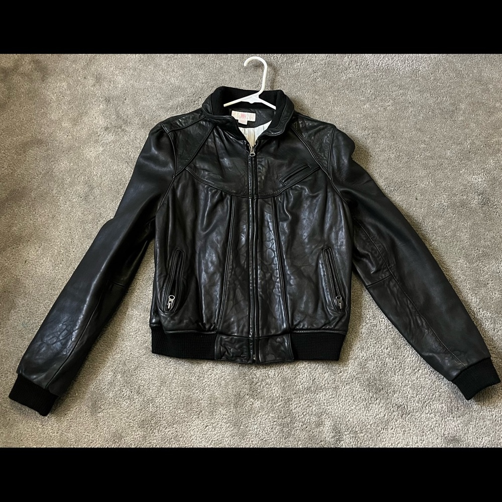 Black Leather Jacket, size large, small tear in back